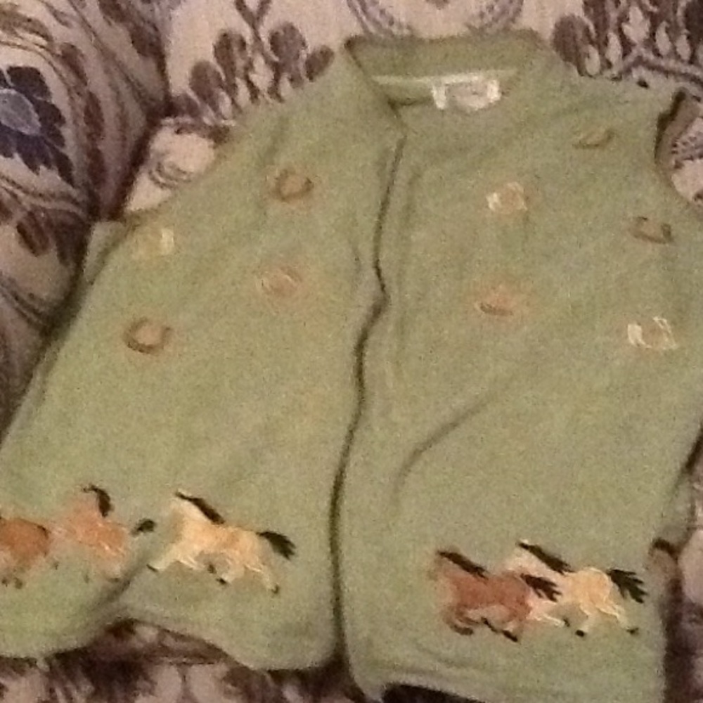 Vest with horses